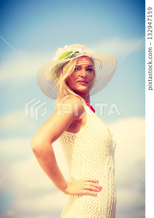 Portrait of beautiful woman during summer Portrait of beautiful woman during summer 132947159