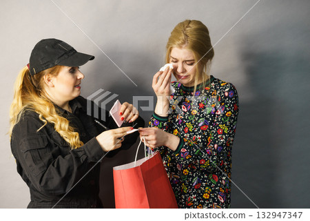 Security guard and shoplifter. Security guard and shoplifter. 132947347