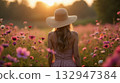 woman in a hat on lavender field 132947384