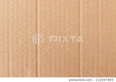 Brown cardboard sheet abstract background, texture of recycle paper box in old vintage pattern for design art work. Brown cardboard sheet abstract background, texture of recycle paper box in old vintage pattern for design art work. 132947469