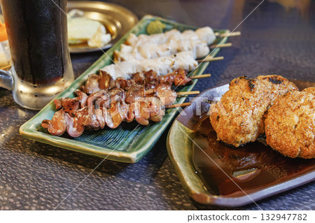 Delicious yakitori (liver) and cold beer 132947782