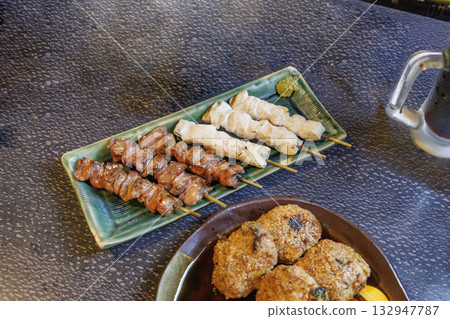 Delicious yakitori (liver) and cold beer 132947787