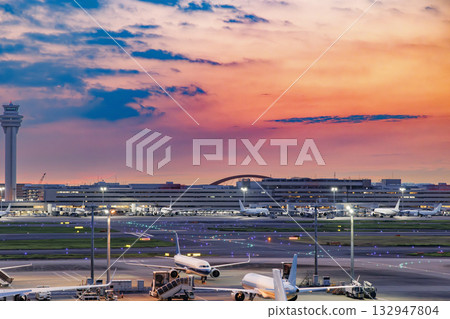 Airport and sunrise (runway, control tower) 132947804