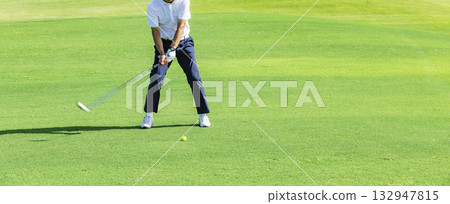 People playing at a beautiful green golf course 132947815