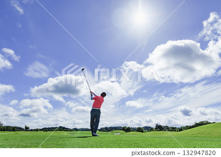 People playing at a beautiful green golf course 132947820