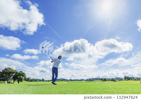 People playing at a beautiful green golf course 132947824