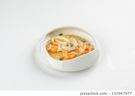Isolated hummus with shrimp and squid rings Isolated hummus with shrimp and squid rings 132947977