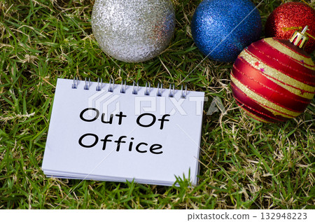 Out of Office Top view of Out of Office text on with Christmas decoration background. 132948223