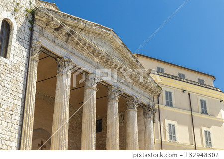 Temple of Minerva columns and architecture in Assisi 132948302