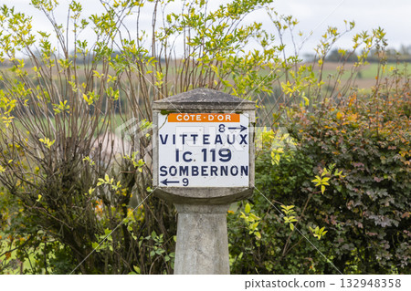 Direction sign pointing to Vitteaux, Sombernon, and D119 in COTE D'OR Direction sign pointing to Vitteaux, Sombernon, and D119 in COTE D'OR 132948358