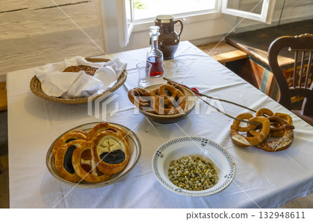Czech kolache, pretzels, and traditional treats on a table in Kourim 132948611