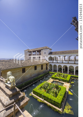 Generalife gardens patio with water channels, Alhambra, Granada, Spain 132948853