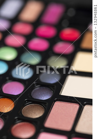 Colorful makeup palette displaying various eyeshadow and blush shades Colorful makeup palette displaying various eyeshadow and blush shades 132948861