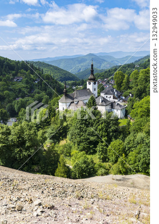 Historical church of Spania Dolina village under blue sky Historical church of Spania Dolina village under blue sky 132949033