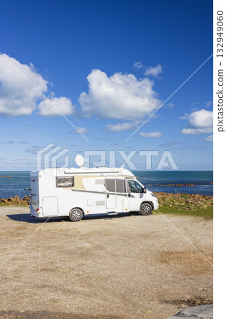 Recreational vehicle parked near the sea on a sunny day 132949060