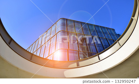 Exterior of modern high-rise buildings in a business district. Tall office buildings. Glass-fronted skyscrapers. Modern business district. Exterior of modern high-rise buildings in a business district. Tall office buildings. Glass-fronted skyscrapers. Modern business district. 132950247