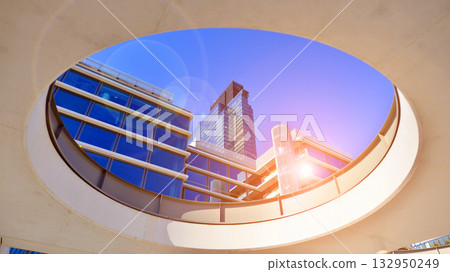 Exterior of modern high-rise buildings in a business district. Tall office buildings. Glass-fronted skyscrapers. Modern business district. Exterior of modern high-rise buildings in a business district. Tall office buildings. Glass-fronted skyscrapers. Modern business district. 132950249