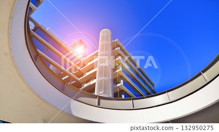 Exterior of modern high-rise buildings in a business district. Tall office buildings. Glass-fronted skyscrapers. Modern business district. 132950275