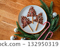 Chocolate Christmas tree candies, festive sweets for holiday table 132950319