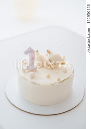 Cute birthday cake with number 1 candle, first birthday celebration 132950366