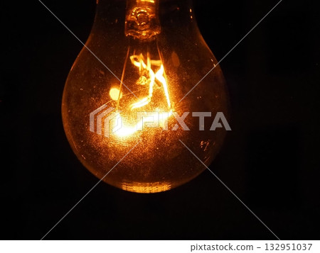 Light bulb with glowing filament Light bulb with glowing filament 132951037