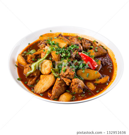 Isolated dapandji chicken stew with potatoes and peppers 132951636