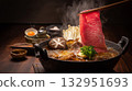 The ultimate dish: Premium Wagyu beef sukiyaki floating in the darkness 132951693