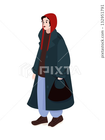 Woman in oversized dark coat and red hood carrying black handbag dressed for cold weather in casual winter street style 132951791