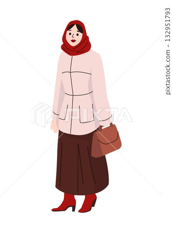 Woman in long brown skirt and pink jacket with red headscarf and boots holding handbag dressed for winter weather 132951793