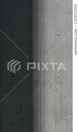 Stunning modern concrete texture background with dramatic shadow and subtle imperfections, perfect for architectural design and industrial themes. 132952009