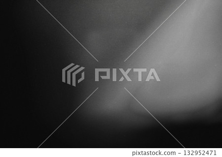 Gray vintage analog film texture with soft grain and light glow fade Gray vintage analog film texture with soft grain and light glow fade 132952471