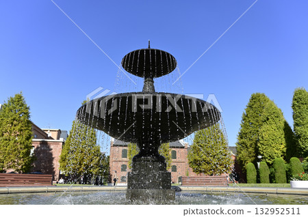 View of the red brick building from the fountain plaza at Noritake Garden (Nagoya City, Aichi Prefecture) 132952511
