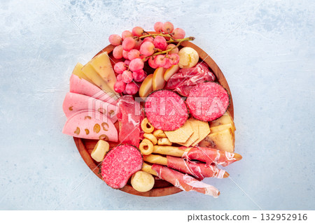 Italian Antipasti tray. Charcuterie platter with cheese and deli meats 132952916