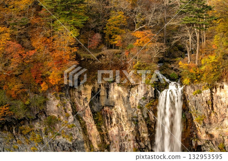Kegon Falls surrounded by autumn leaves 132953595