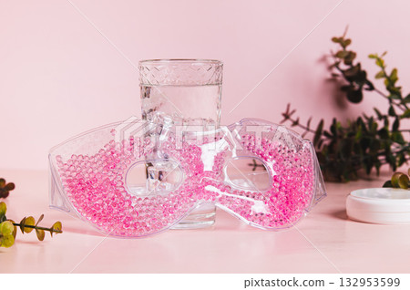 Cooling cryo-ice face mask on pink background 132953599