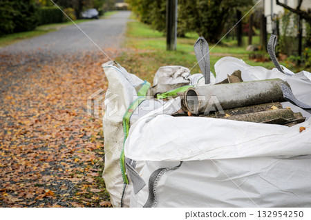 Asbestos Waste Pipes and Roofing Sheets in Bags. Hazardous waste and environmental safety Asbestos Waste Pipes and Roofing Sheets in Bags. Hazardous waste and environmental safety 132954250