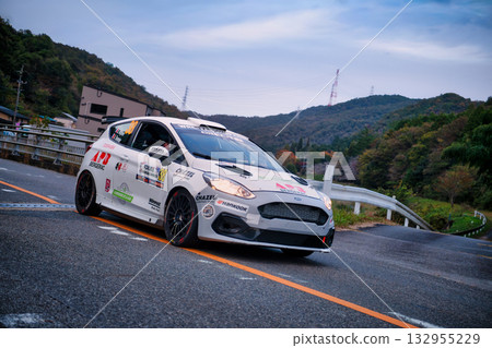 WRC racing car on public roads WRC racing car on public roads 132955229