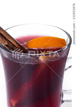 Mulled Wine with Orange and Cinnamon Sticks and Christmas decoration Mulled Wine with Orange and Cinnamon Sticks and Christmas decoration 132955878