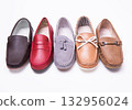 Different moccasins for a boy 132956024