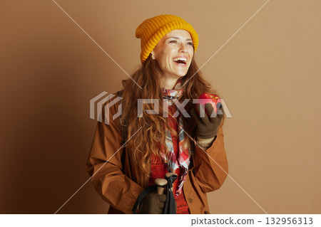 Laughing Hiker with Red Apple 132956313