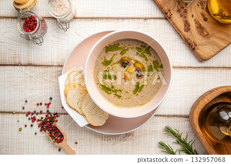 Creamy mushroom soup with croutons 132957068