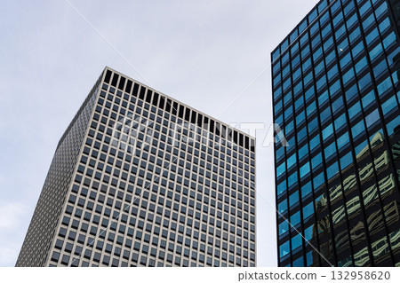 Modern architecture of downtown Chicago skyscrapers against a blue sky 132958620