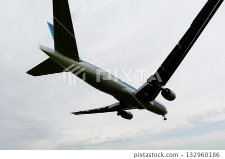 Powerful | Landing plane | Looking up shot Powerful | Landing plane | Looking up shot 132960186