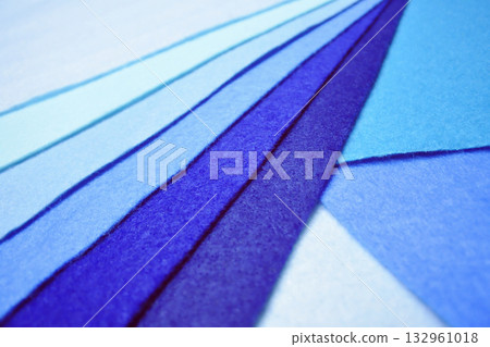 Gradation of overlapping cool-colored felt fabric, close-up, craft, sewing, fabric, handmade 132961018