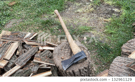 Chopping slab firewood for stove ignition Chopping slab firewood for stove ignition 132961129