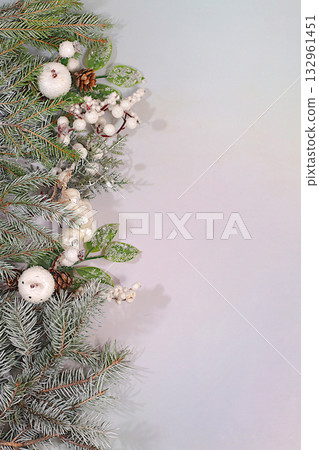 Beautiful Christmas and New Year background with live fir branches, decorations and toys, product design for holiday advertising, Christmas Eve concept, Festive winter card and banner on the screen Beautiful Christmas and New Year background with live fir branches, decorations and toys, product design for holiday advertising, Christmas Eve concept, Festive winter card and banner on the screen 132961451