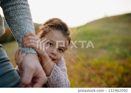 Portrait of beautiful young girl on walk in autumn nature, spending sunday outdoors. Portrait of beautiful young girl on walk in autumn nature, spending sunday outdoors. 132962092