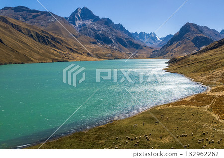 Aerial view of the Querococha lagoon, in the Ancash region. Aerial view of the Querococha lagoon, in the Ancash region. 132962262