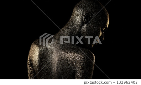 Gold Dust Body Art Silhouetted Figure in Dark Studio Lighting with Shimmering Glitter Texture Portrait 132962402