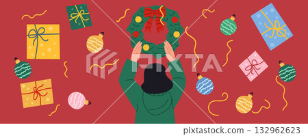 Holiday banner with woman decorating for Christmas, New Year with wreath, surrounded by festive gifts, Christmas balls, and confetti on a bright red background. Perfect for seasonal greeting 132962623